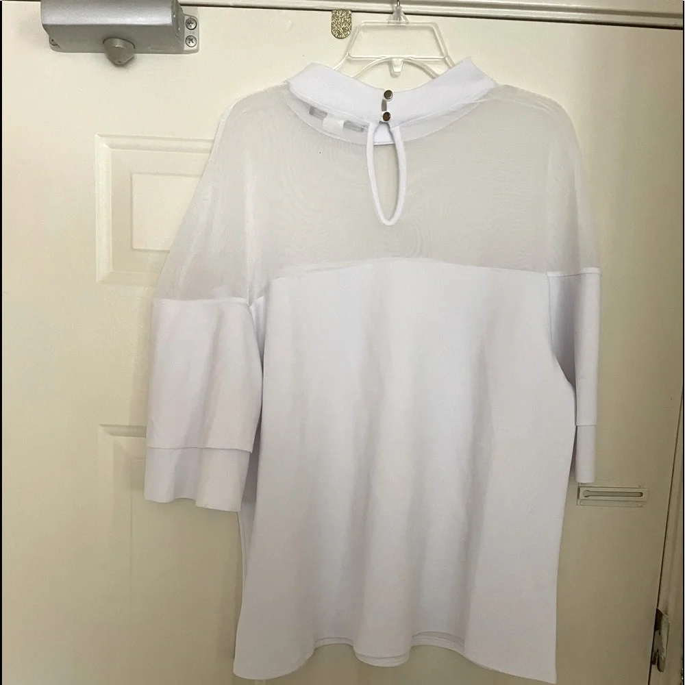 Touch me white top. She has sheer collar and layered bell sleeves - Picture 2 of 3